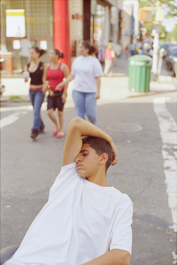 young man sleeping in hot weather
