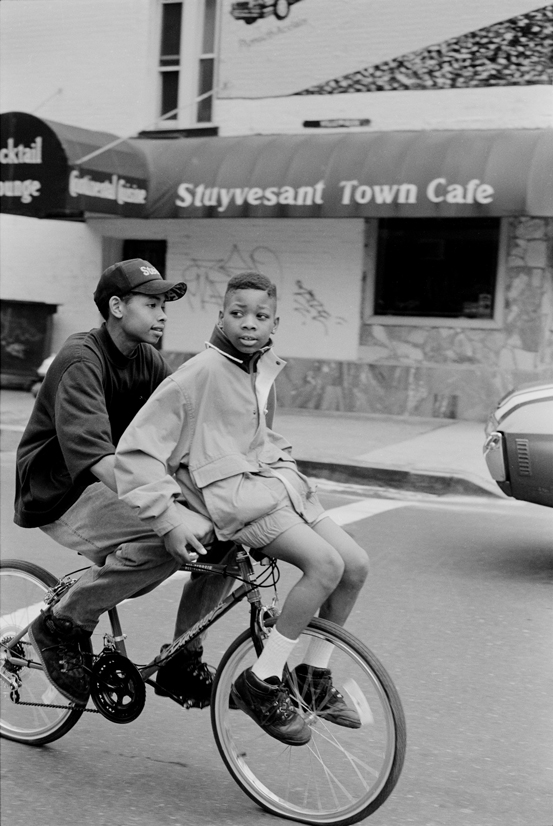 2 boys riding a bike, NYC, 1990